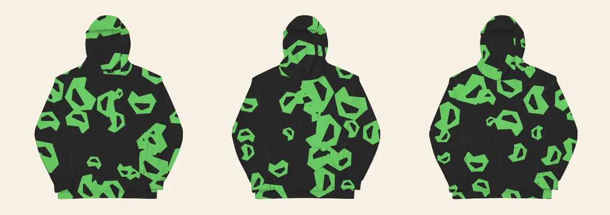 Three different davis9001 hoodies, side by side, each from its own design code: the same large green marks, turned and placed differently every time.